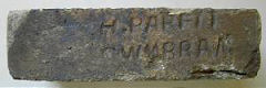 
An early example with 'H Parfit Cwmbran' with 1 'T', imprinted in the side of the brick
