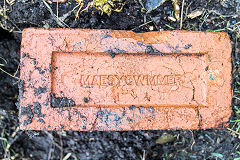 
A brick from Maes-y-Cwmmer brickworks