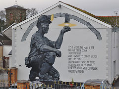 
Mural on the wall of the 'Castle Hotel', now a funeral home, November 2023