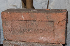 
'Day Usk Mon' probably from Castle brickworks, on display at Usk Rural History Museum
