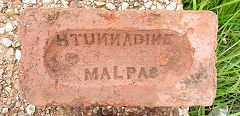 
'H Tunnadine Malpas' with three reversed 'N's and a reversed 'S', © Photo courtesy of Jase Foxe