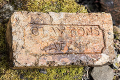 
'Clayton's Patent', the reverse of 'D Davis B G A'  possibly from Blaengwawr Brickworks, Aberaman