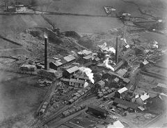 Cwmgors Brickworks to the left with a large pile of bricks, Gwaun-cae-gurwen