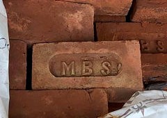 'MBS', Manchester Brick Specialists are importers from Asia and have the bricks stamped with their initials