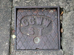 
'CCWW ST', Cardiff Corporation Water Works Stop Tap valve cover, found in Barry, S. Glam, July 2021