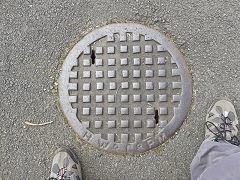 'HW & Co PM' draincover, probably 'Henry White Pontymister', Risca, April 2020, © Photo courtesy of Martyn Davies