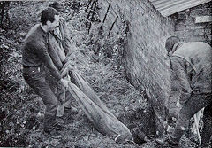
Attaching the earth wire of the generator to a water pipe, 1967, © Photo courtesy of 'Brockham Museum News' and A W Deller