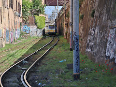 
Centocelle Railway '421' on the gauntletted track at the tram depot, Rome, May 2022
