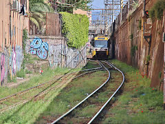 
Centocelle Railway '835' on the gauntletted track at the tram depot, Rome, May 2022