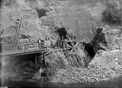 
Miners outside one of the Crown Mine tunnels, © Photo courtesy of  Auckland Museum